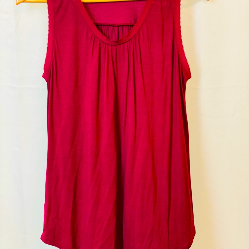 LOFT SLEEVELESS TSHIRT TYPE MATERIAL. NEVER WORN.